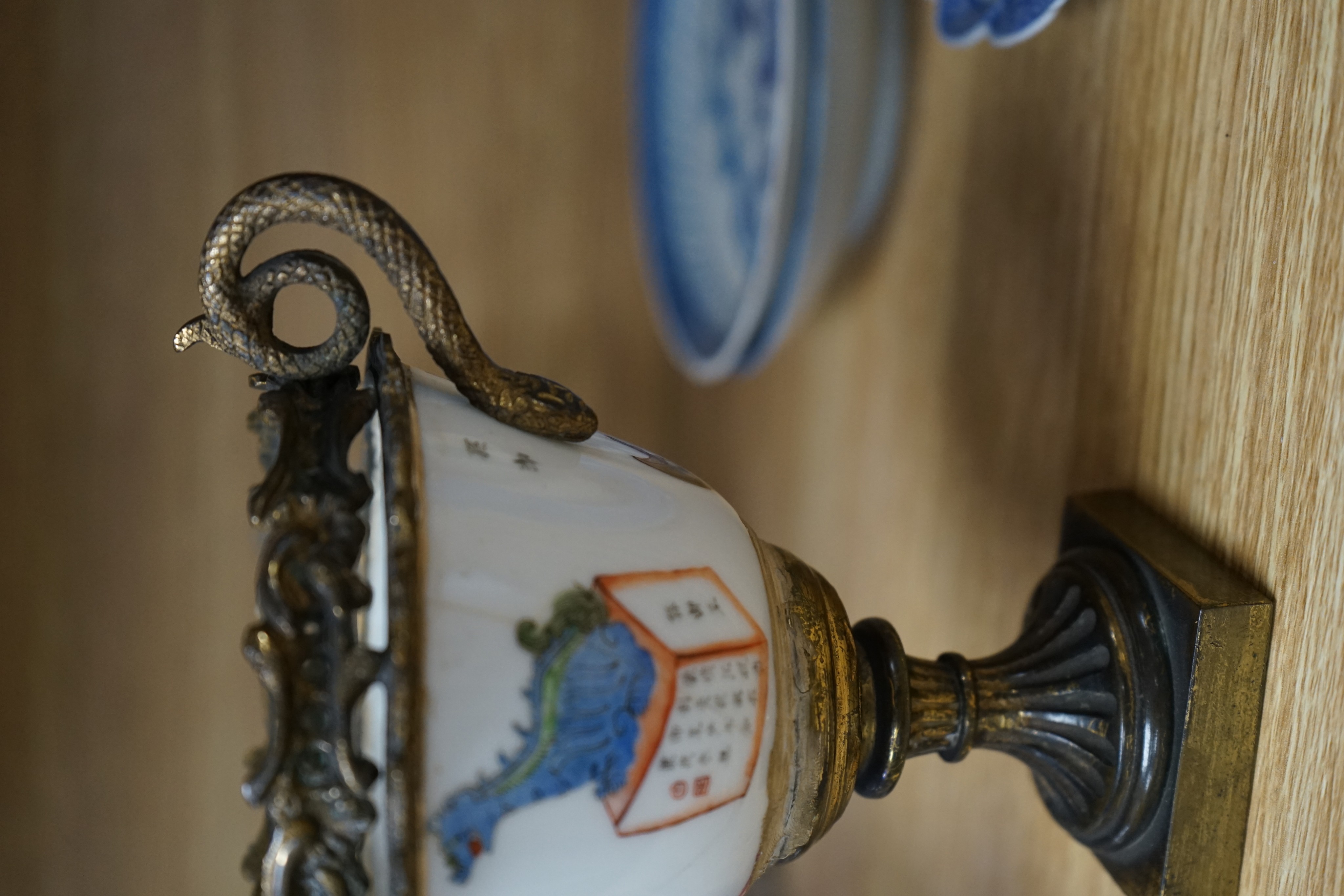 Two cut glass bowls and a Chinese brass mounted cup, 16cm